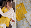 Yellow color bandhani design kurti plazzo set with dupatta.